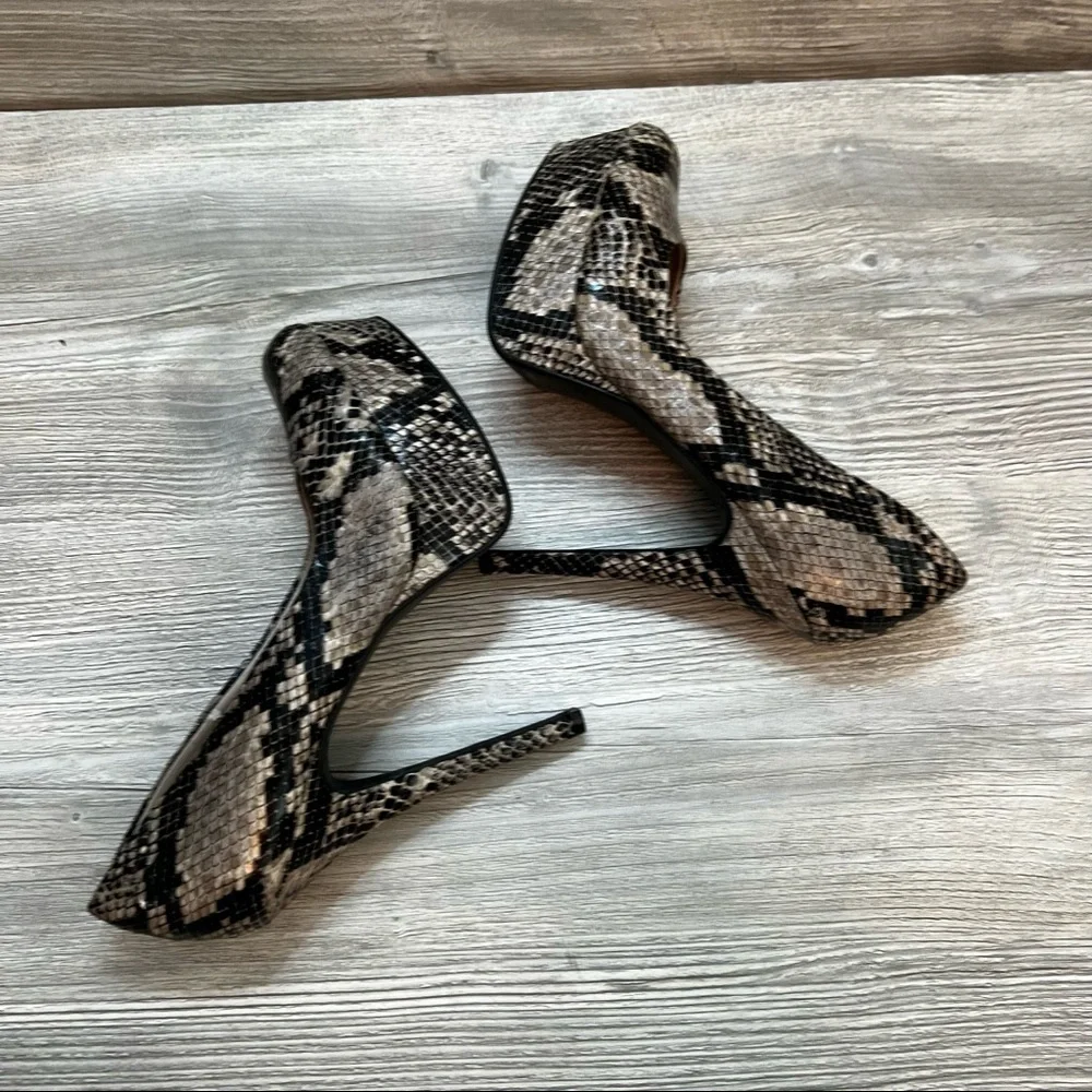 Olsenboye tall platform snakeskin patterned high heels. Closed toe size 9